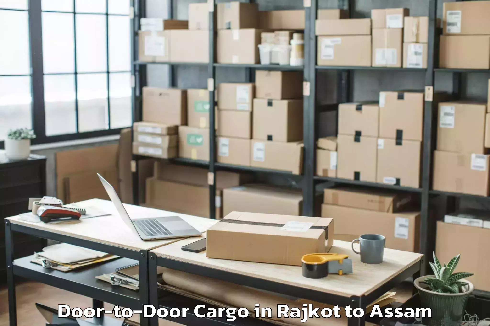 Book Rajkot to Rangia Door To Door Cargo Online